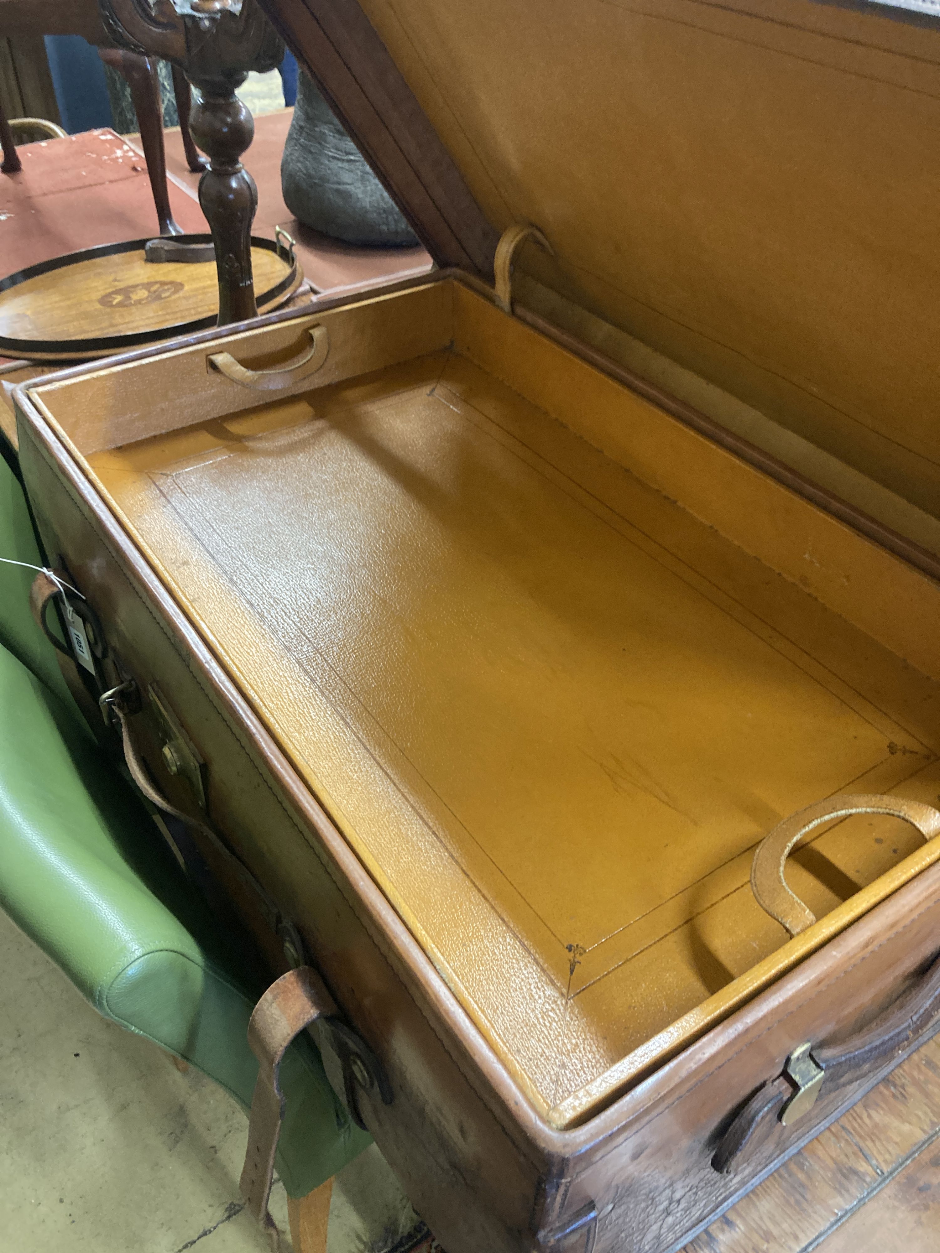 A Harrods leather trunk circa 1900, length 92cm, depth 58cm, height 33cm